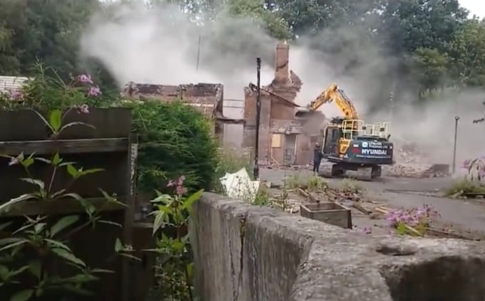 The remains of the Crooked House were demolished a day after the fire